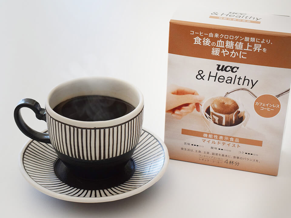 UCC &Healthy『マイルドテイスト』パッケージとコーヒーカップ